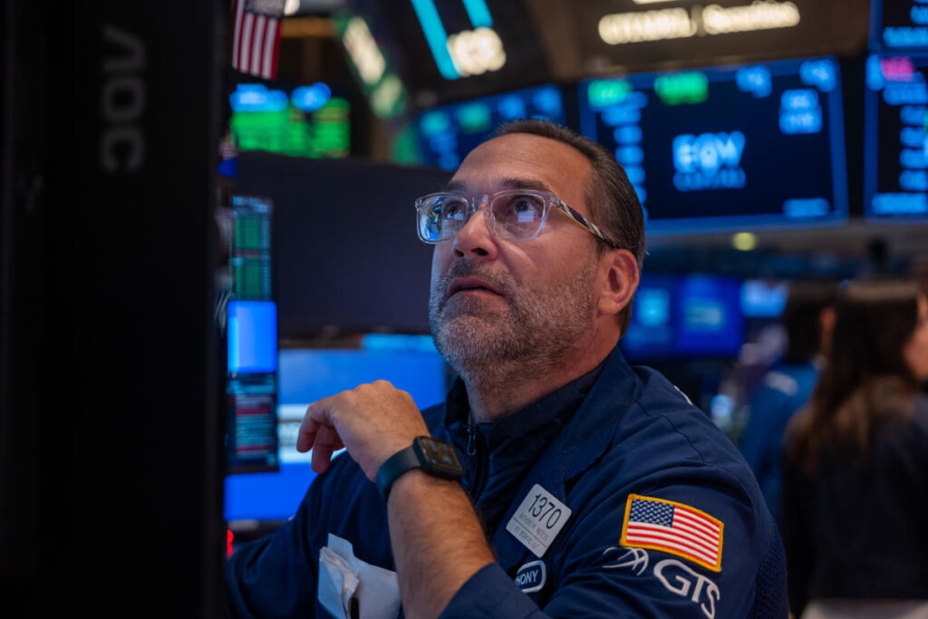 S&P 500, Nasdaq rise, nearly wiping out week's losses in wild turnaround
