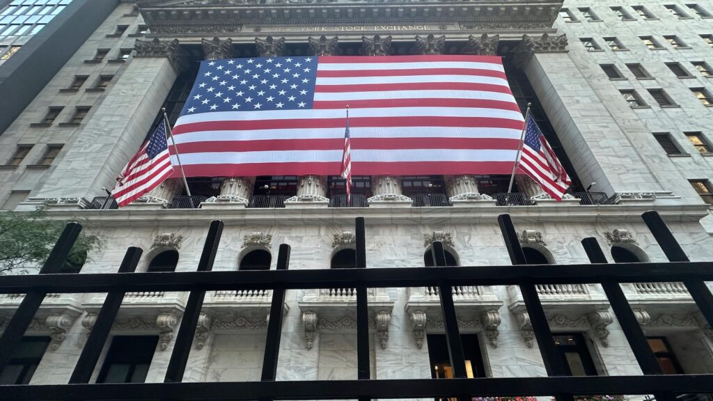 Stock market today: Wall Street holds relatively steady following weeks of sharp swings