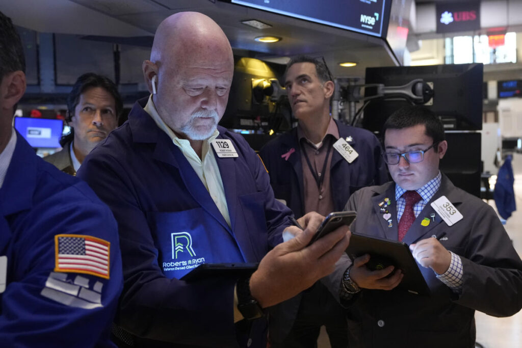 US stocks start jobs report week lower with Powell set to speak