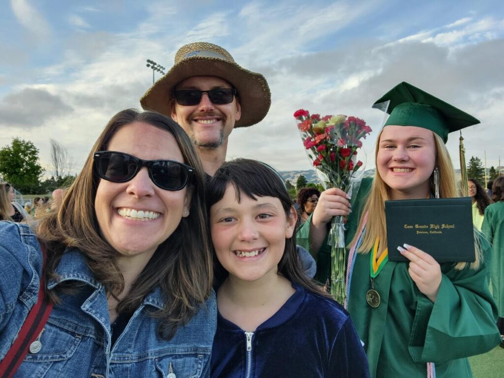 Matilda, an exchange student from Austria, celebrates graduation from Casa Grande High School with her host family. (Photo courtesy of Alicia Cerruti)