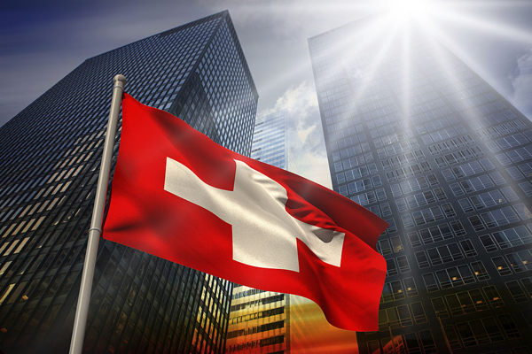 Swiss franc calm as inflation drops