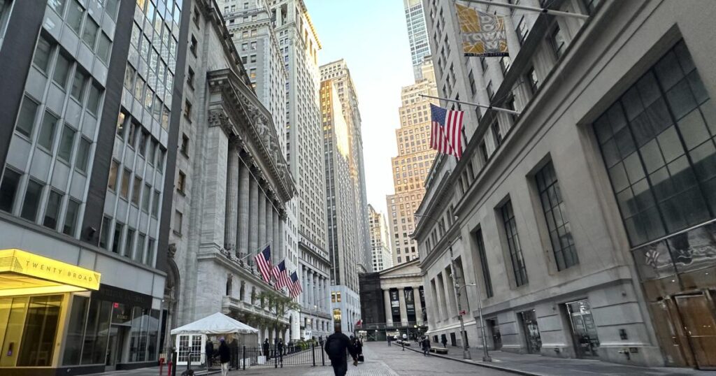 Wall Street drifts near its records after latest economic data