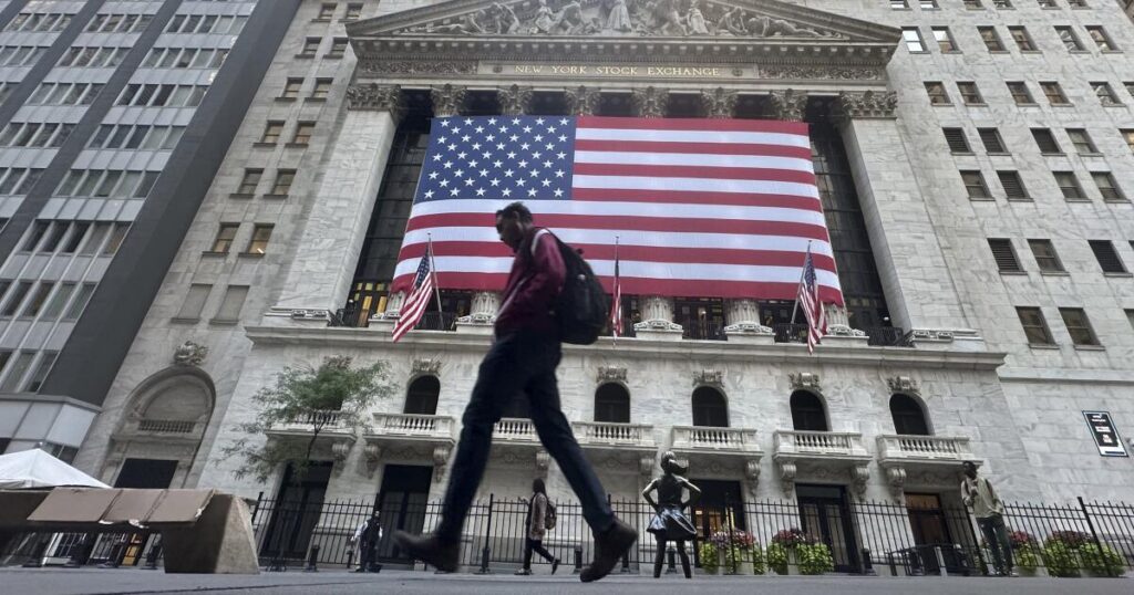 Wall Street rises to new records as bank and financial stocks jump