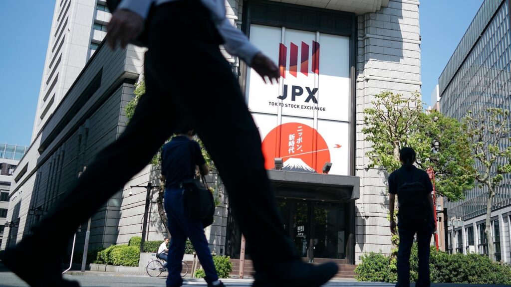 Stock market today: Asia shares mostly decline as investors await earnings, US elections