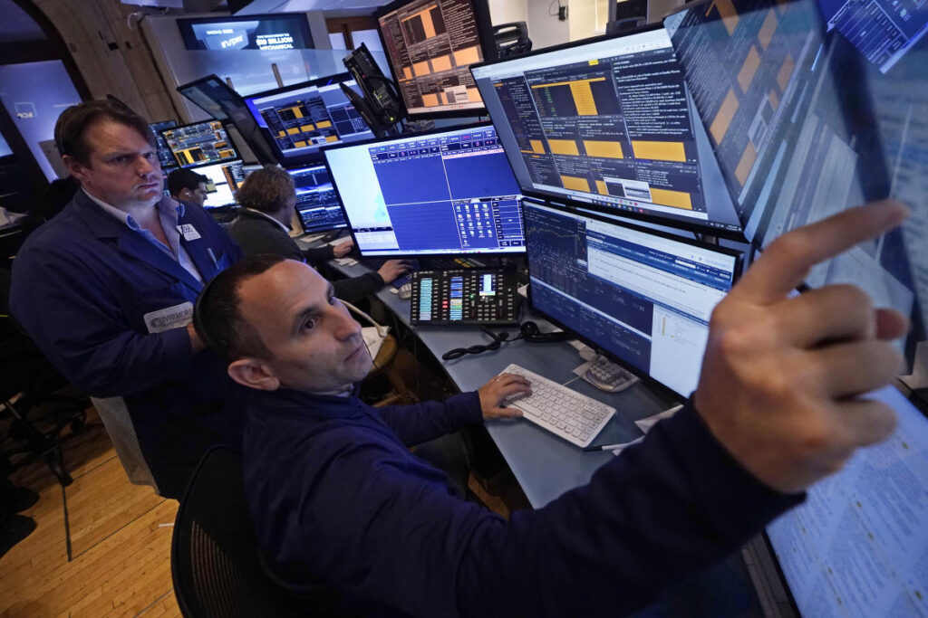 Dow, S&P 500 close above key milestones as Tesla, bitcoin surge