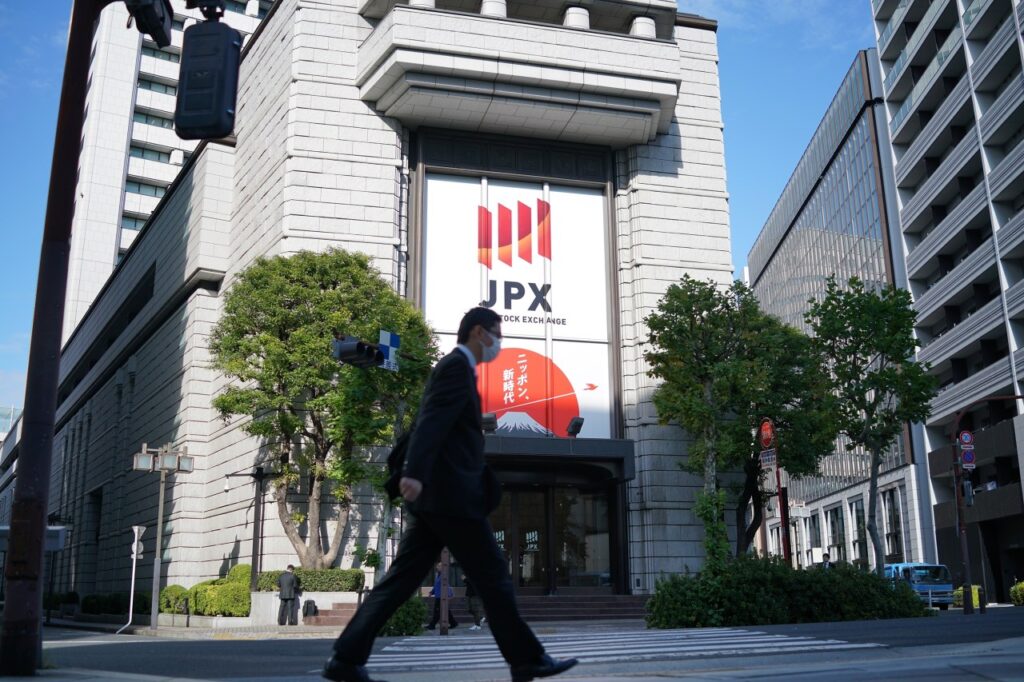 Stock market today: Asian shares are mixed, with China benchmarks higher despite tariff talk