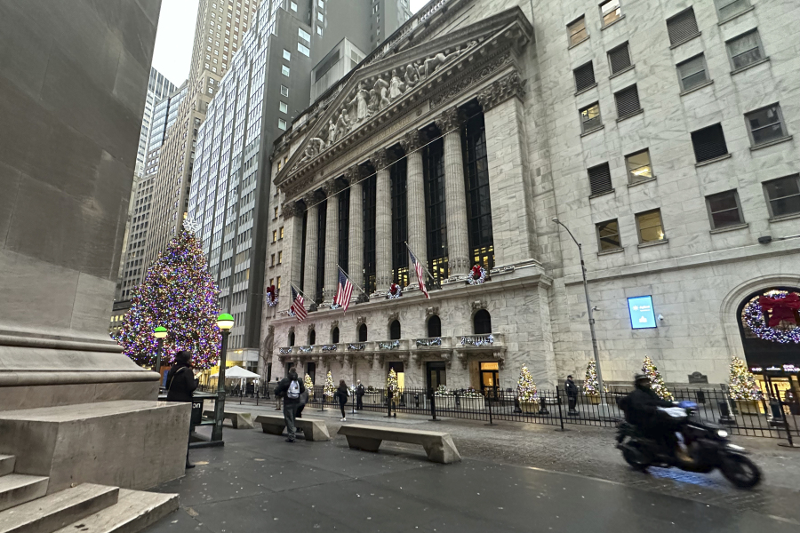 A scooter passes the New York Stock Exchange in New York&rsquo;s Financial District on Tuesday, Dec. 17, 2024.