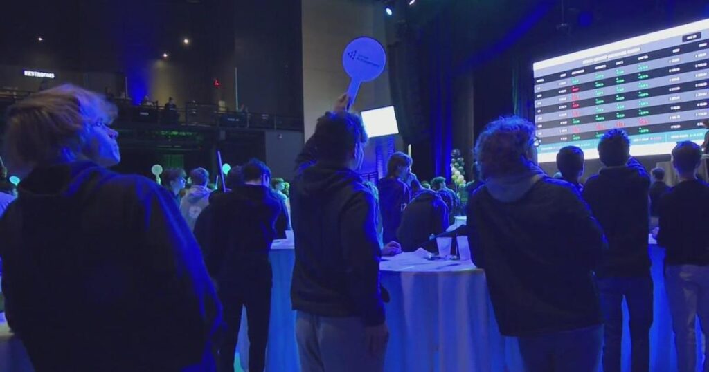 Stage AE turns Wall Street as students participate in stock exchange trading simulation